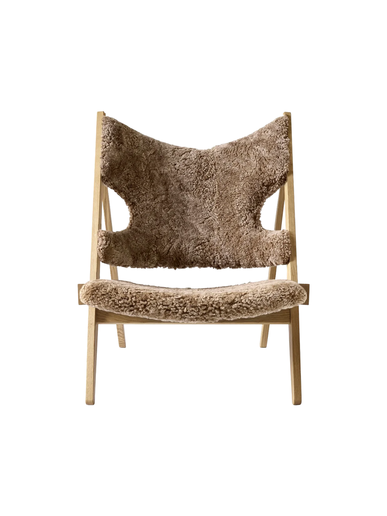 Front view of the Knitting Lounge Chair with a natural oak frame, upholstered in textured, light brown Sahara sheepskin.