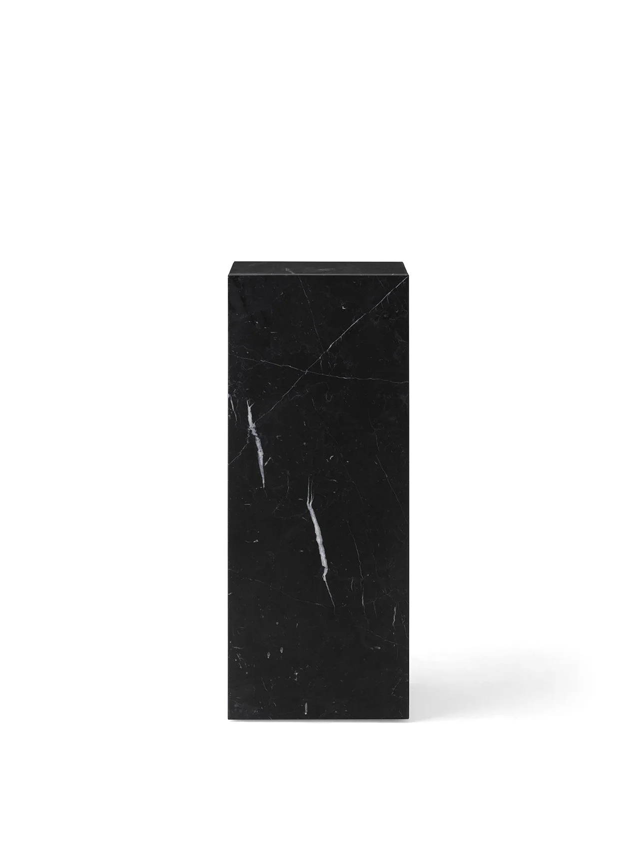 A front view of the Plinth Pedestal in Nero Marquina, a tall rectangular plinth made of black marble with white veining.