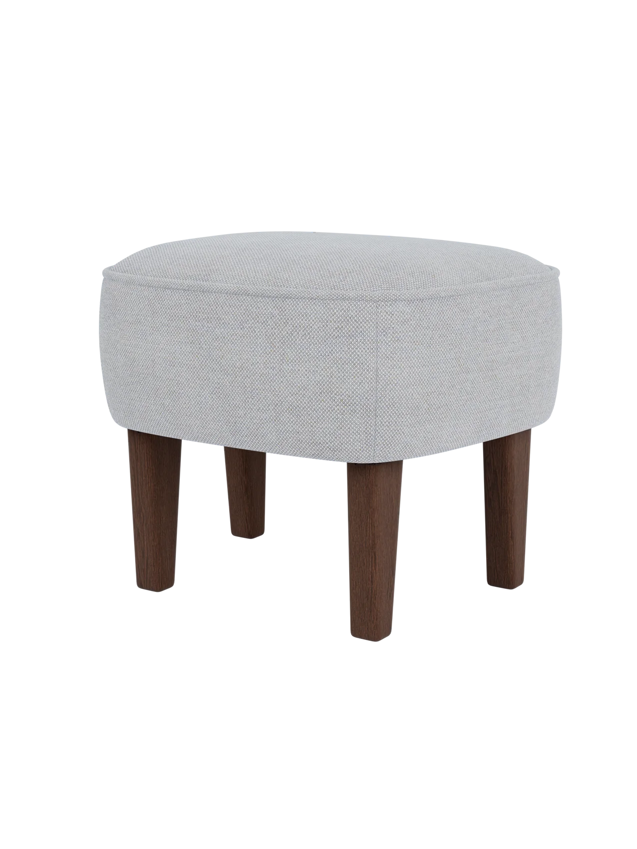 The Ingeborg Ottoman in a light grey Fiord 751 textile, shown from a three-quarter angle with dark-stained smoked oak legs.
