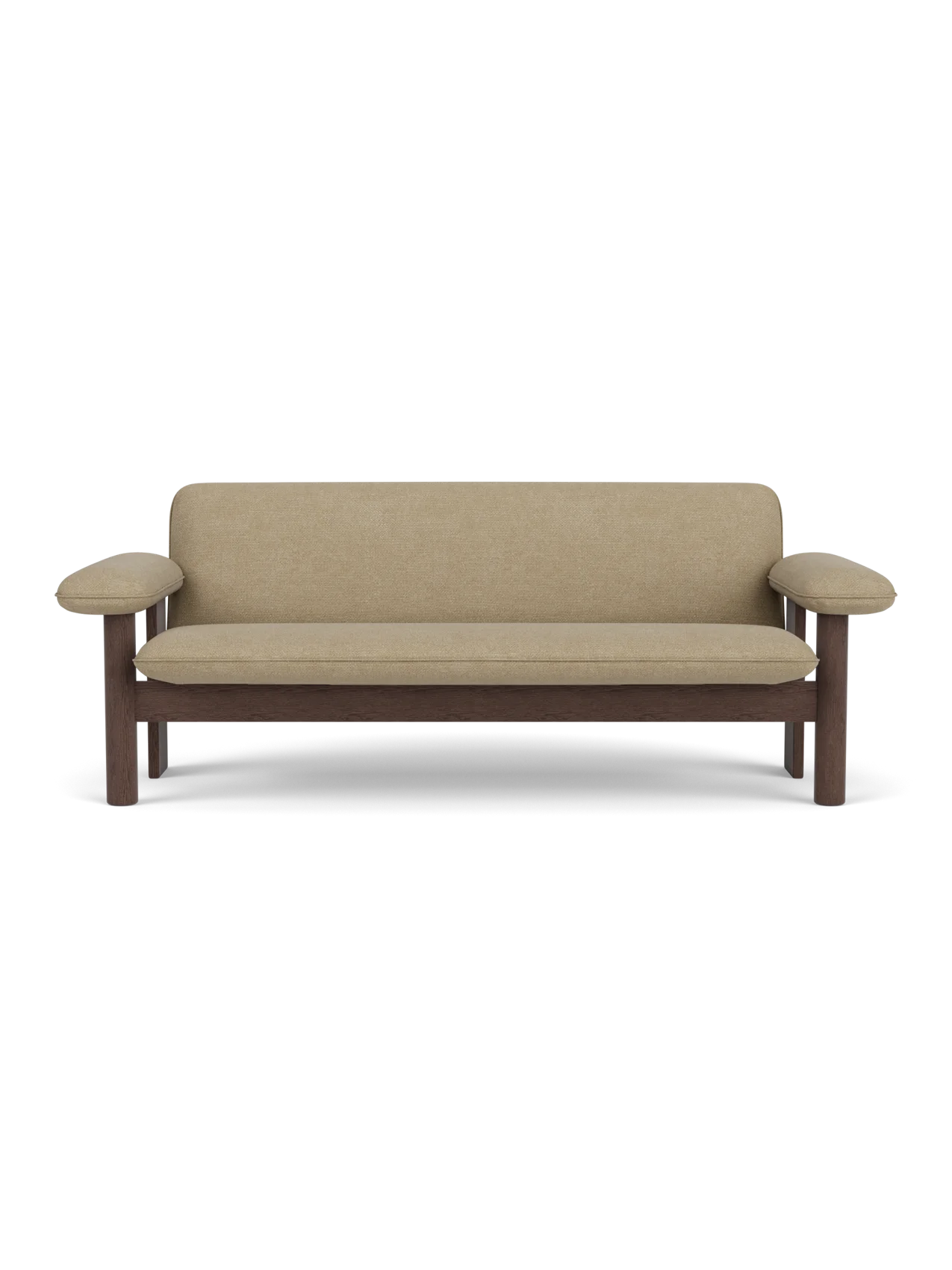 A front view of the Brasilia Sofa, featuring a dark stained oak frame with thick cushions upholstered in Audo Bouclé 02.
