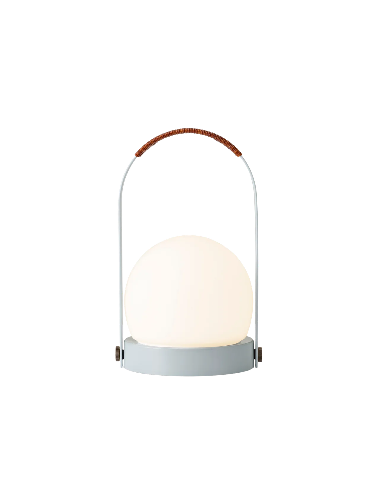 Portable Carrie Table Lamp in Linen Blue with an illuminated opal glass shade and a brown leather-wrapped handle.