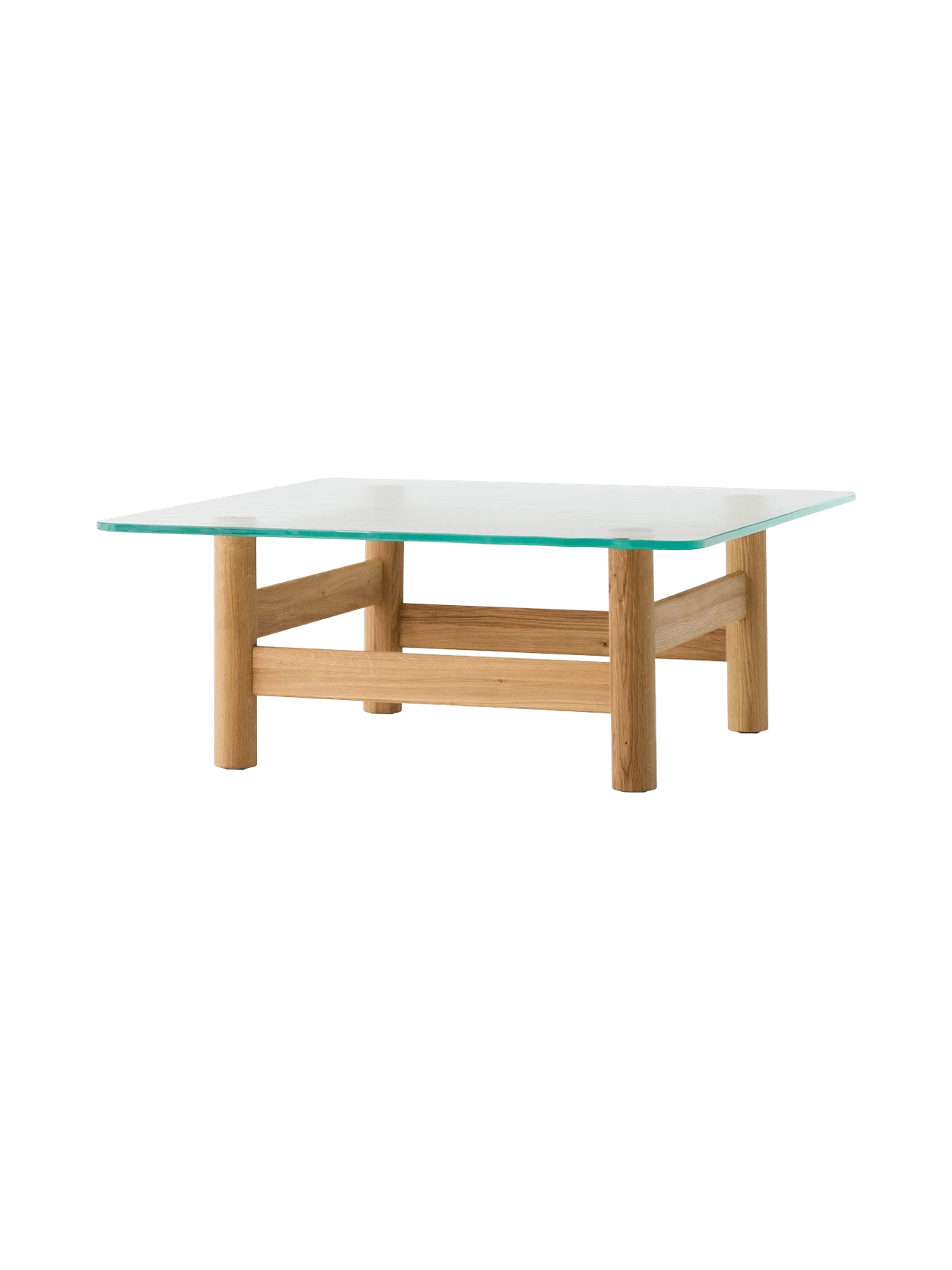 Brasilia Lounge Table, shown from a side angle, with a square glass top and a solid natural oak base on a black background.
