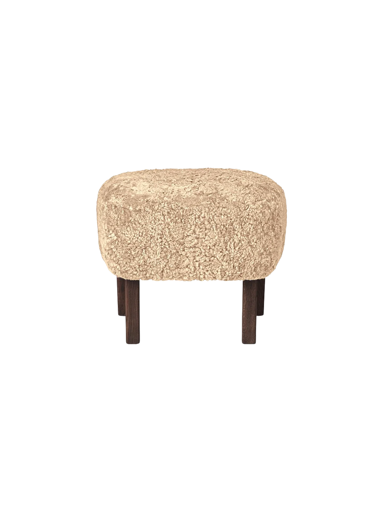Side view of the Ingeborg Ottoman with a plush, honey-coloured sheepskin seat and short, dark-stained oak legs.