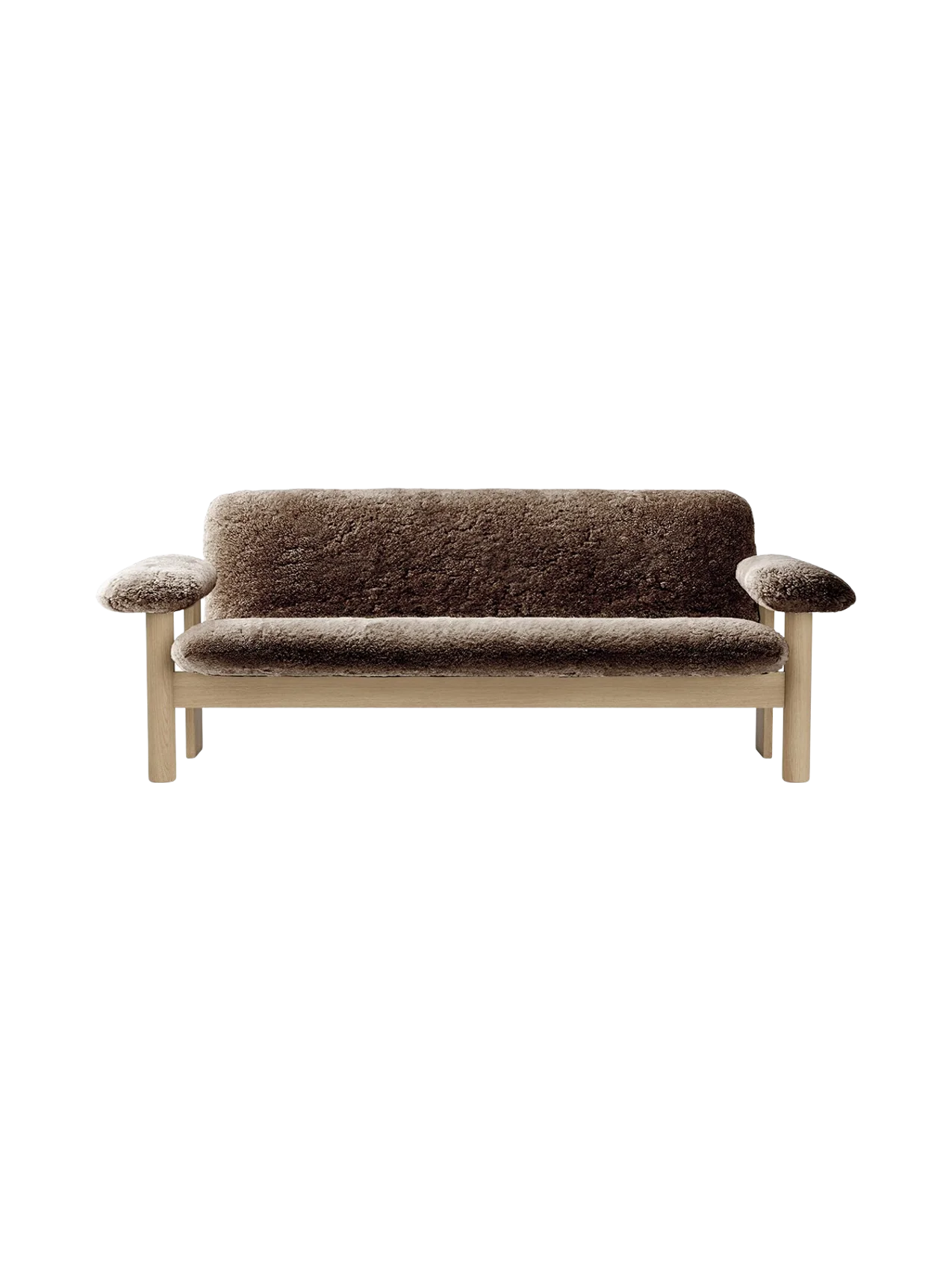 Front view of the Brasilia Sofa, upholstered in plush brown sheepskin, featuring a natural oak frame and rounded armrests.