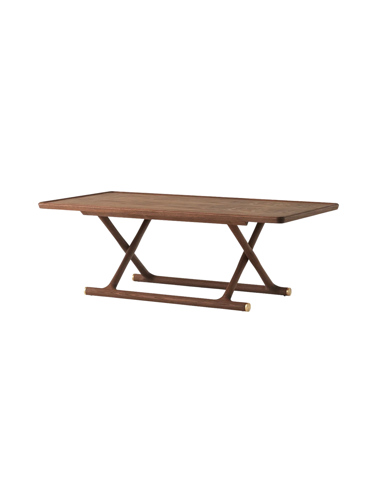 Jäger Lounge Table in oiled walnut shown at an angle, with a rectangular top and foldable X-shaped base with brass fittings.