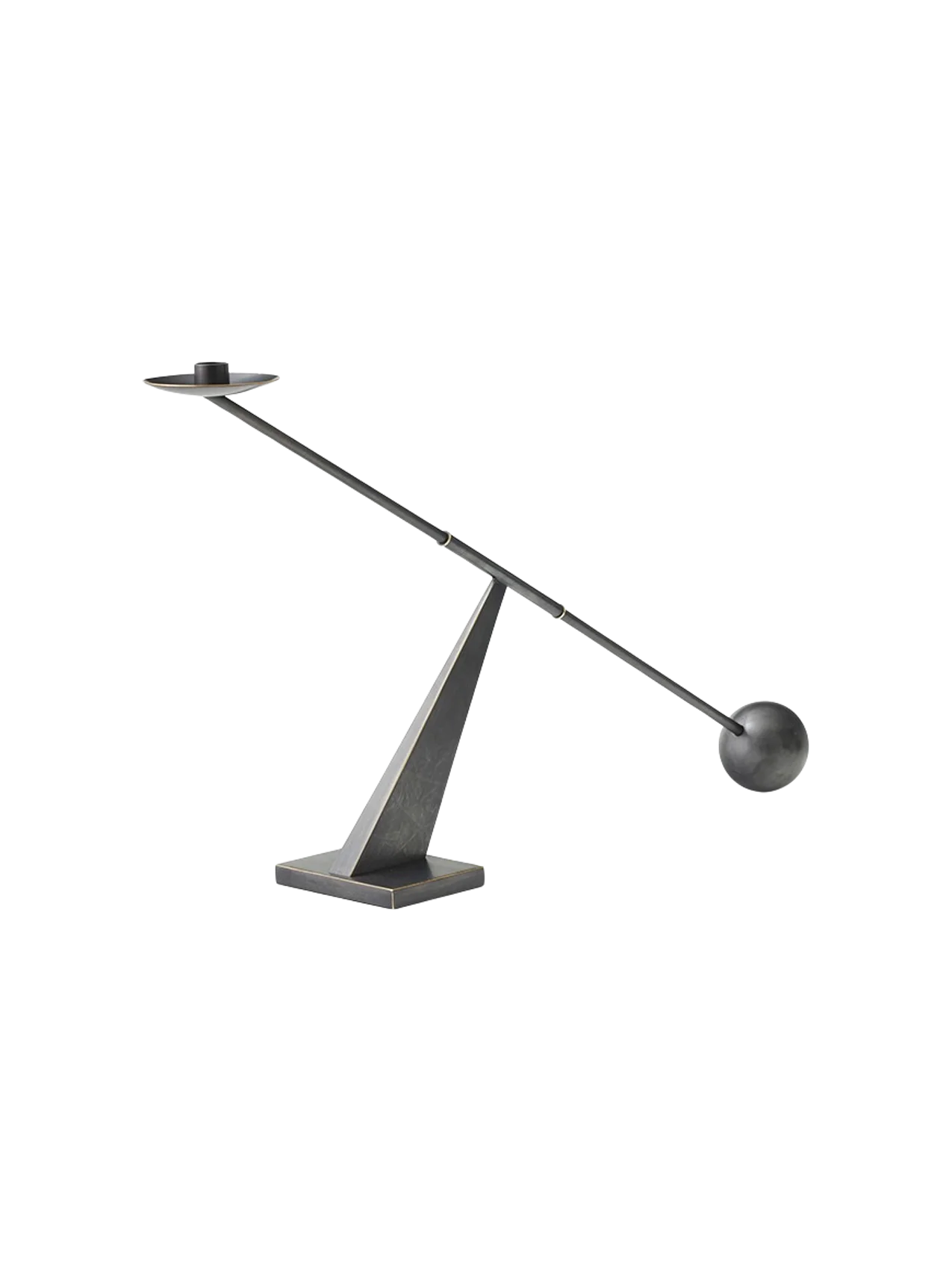 The Poem Candleholder in bronzed steel. A balanced rod with a candle socket and sphere rests on a triangular base.