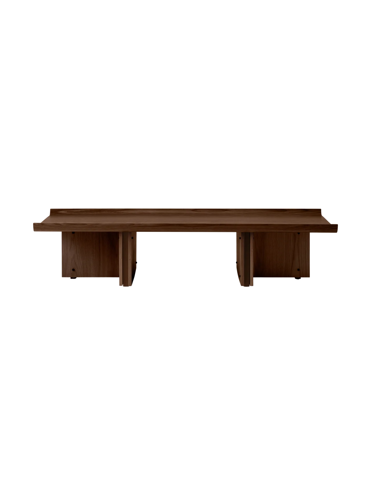 Low walnut wood bench with rectangular top, raised edges and two solid panel legs, minimalist Danish design