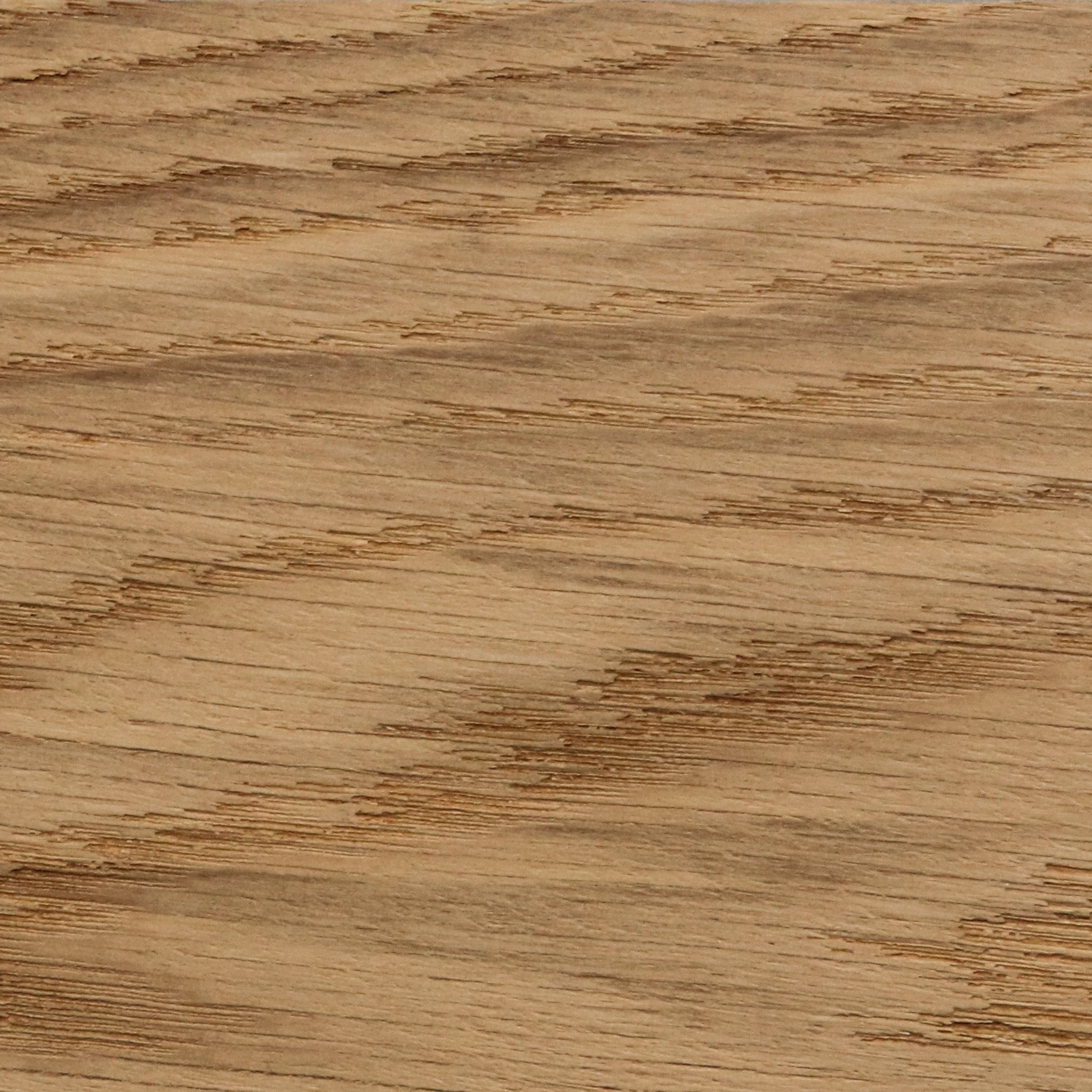 A detailed, close-up image of a golden oak wood finish, showcasing its natural grain and texture.
