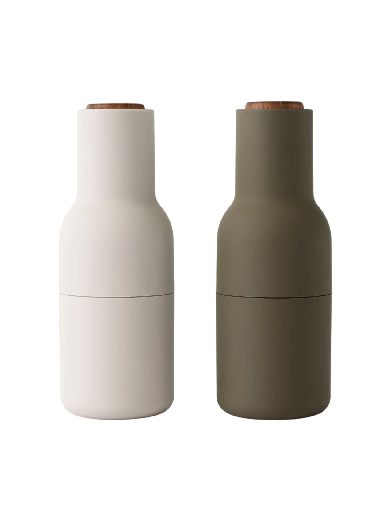 A pair of Audo CPH Bottle Grinders, one in beige and one in hunting green, both with solid walnut lids, shown from the front.