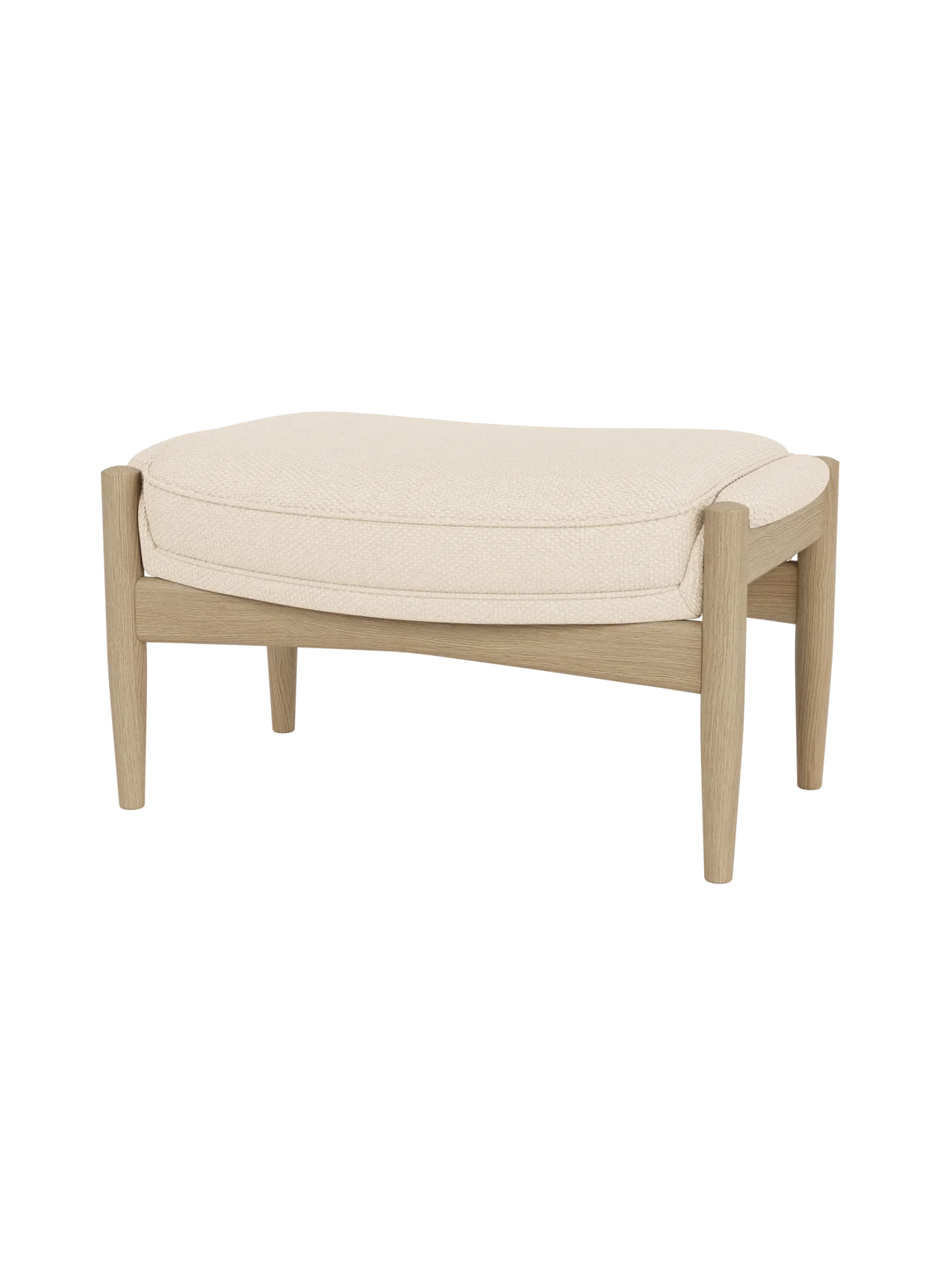 The Seal Ottoman in Natural Oak with Logan Jasmine fabric upholstery, featuring organic mid-century modern curves.