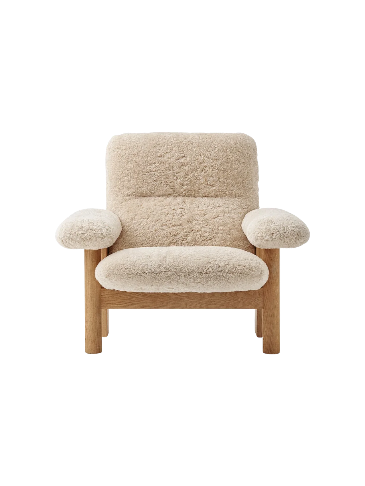 Front view of the Brasilia Lounge Chair. It has a high back, natural oak frame, and thick, comfortable sheepskin upholstery.