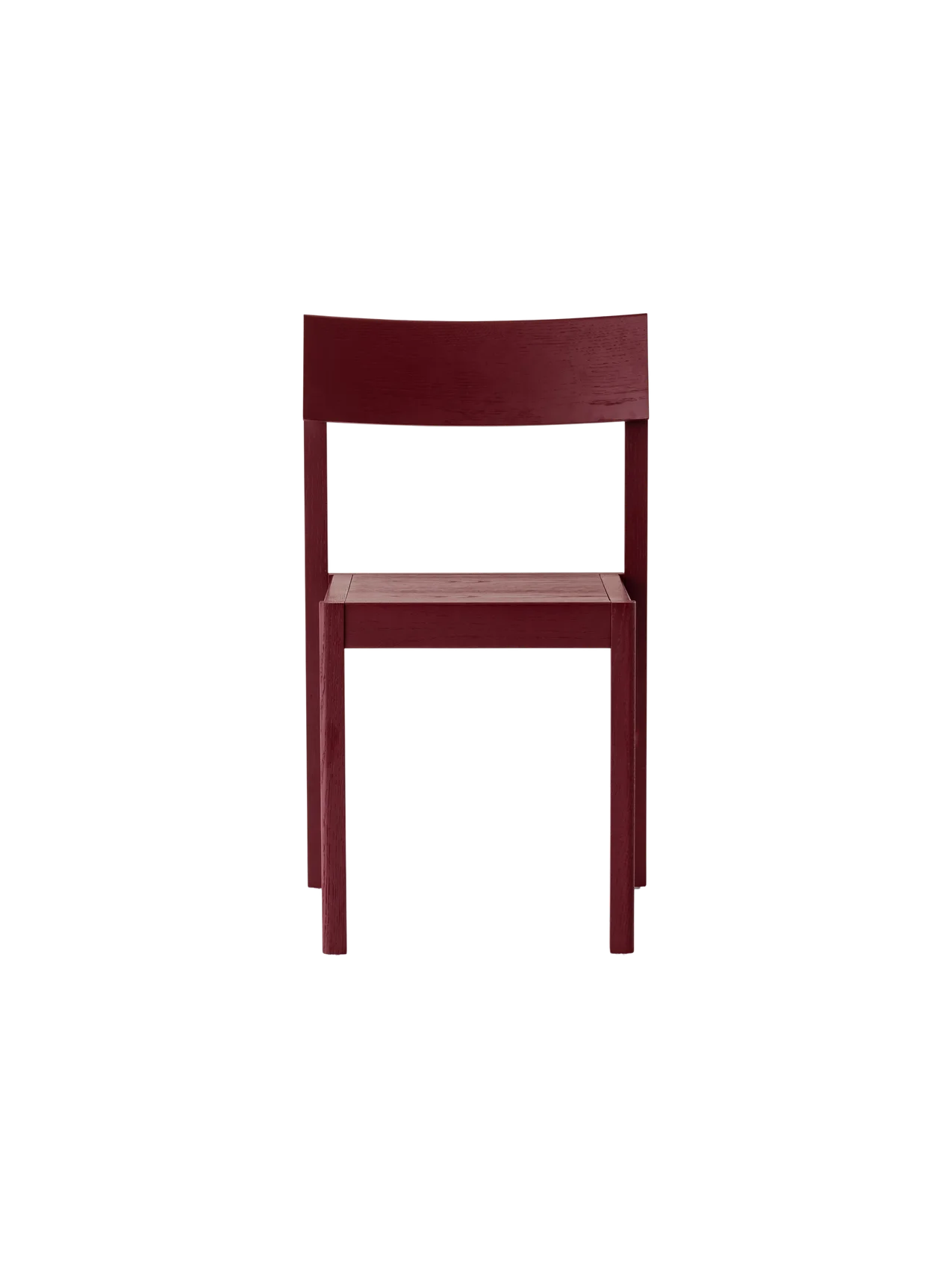 Mauro Dining Chair in French red oak, featuring a curved veneer seat and backrest on a solid wood frame.
