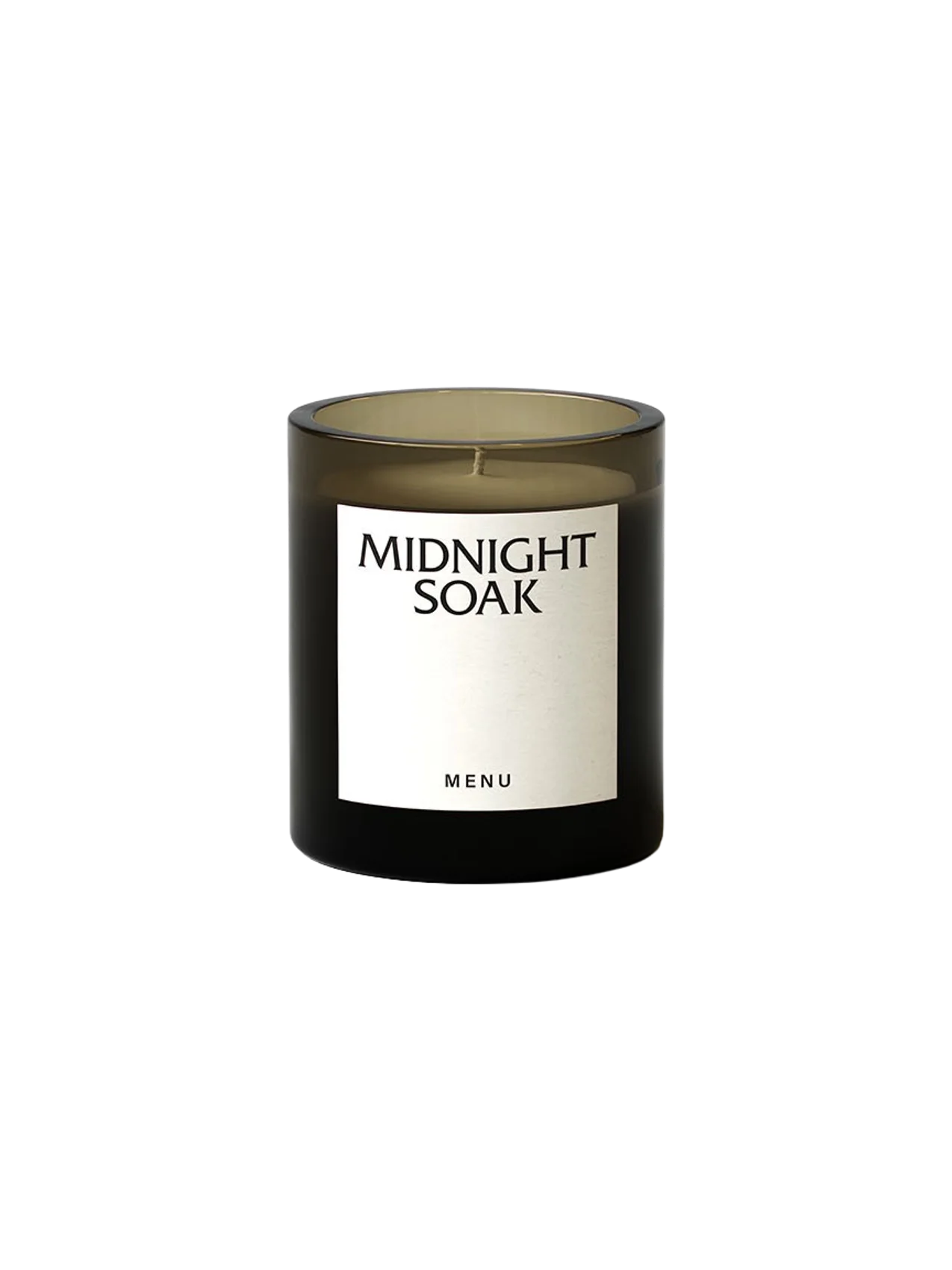 A close-up of the Olfacte Scented Candle in 'Midnight Soak'. The candle is poured into a dark glass jar with a white label.