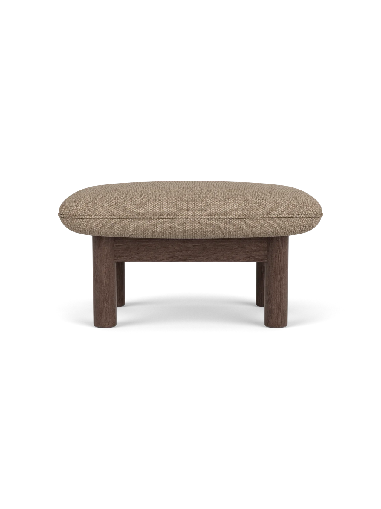 Side view of the Brasilia Ottoman in dark stained oak with a textured Logan Flint textile cushion, on a black background.