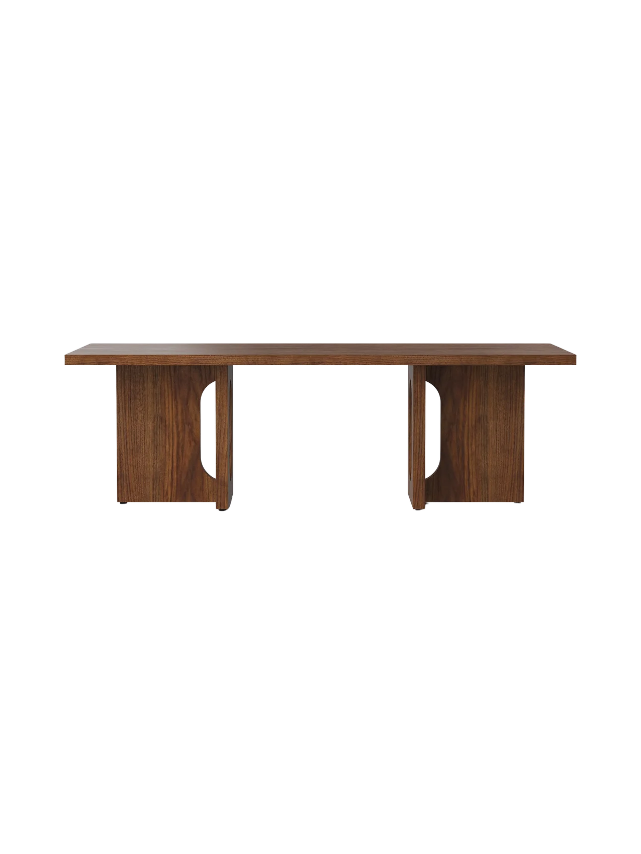 A front view of the Androgyne Lounge Table in a walnut finish. The long, low coffee table features two wide, block-like legs.