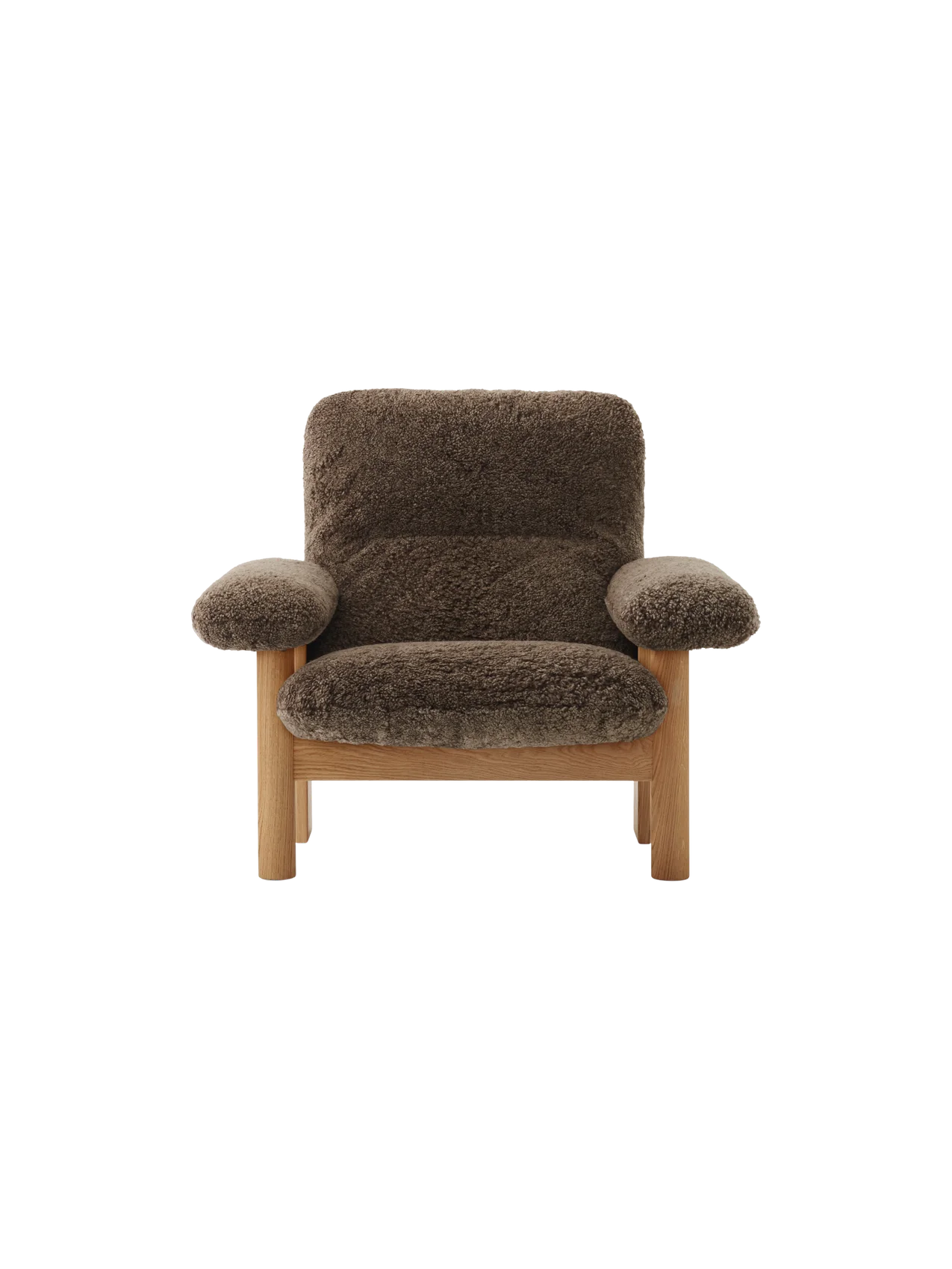 Front view of the high-back Brasilia Lounge Chair with a natural oak frame and upholstered in dark brown Root sheepskin.
