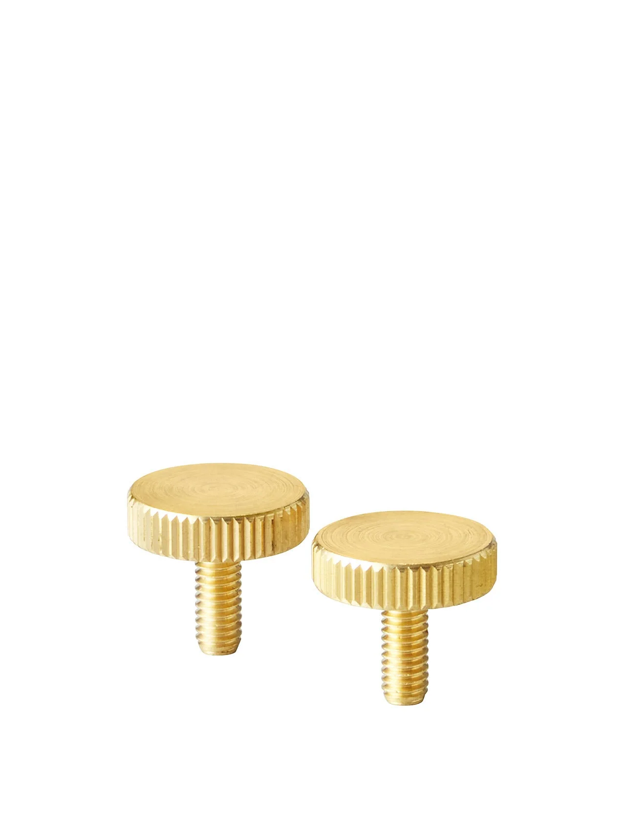 A pair of brass thumbscrews with flat, circular heads and ridged edges, pictured against a plain white background.