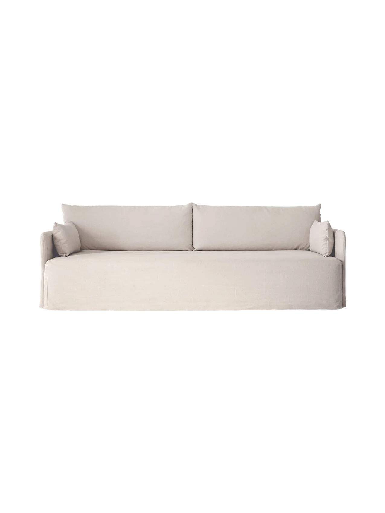 Front view of the Offset Sofa w. Loose Cover, a 3-seater with light grey fabric, two back cushions and two side cushions.