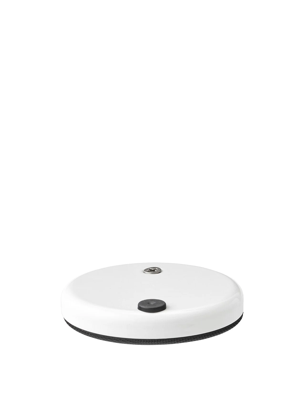 A close-up view of a circular, white metal base, featuring a black button and a silver screw on its surface.