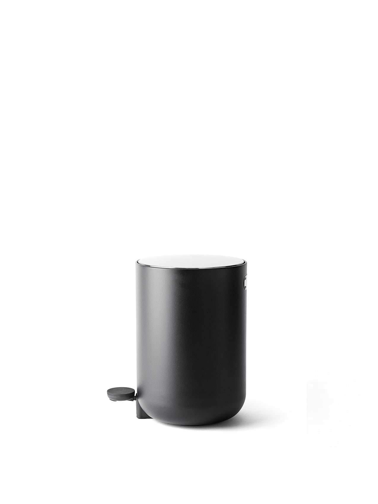 A studio photo of the black 7-litre Pedal Bin, with a matte cylindrical body, a foot pedal, and a contrasting white lid.