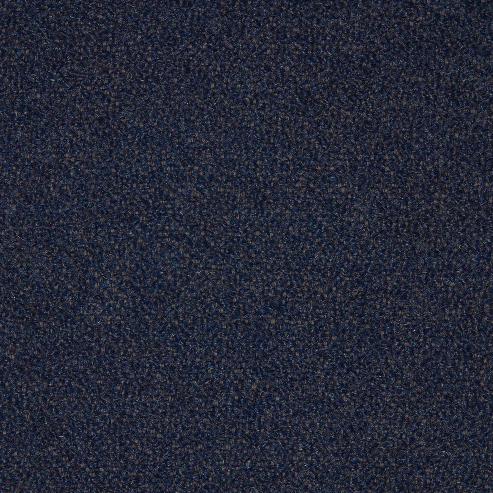 A detailed close-up of the Barnum UK Bouclé 19 fabric swatch, highlighting its textured looped weave in a dark navy blue.