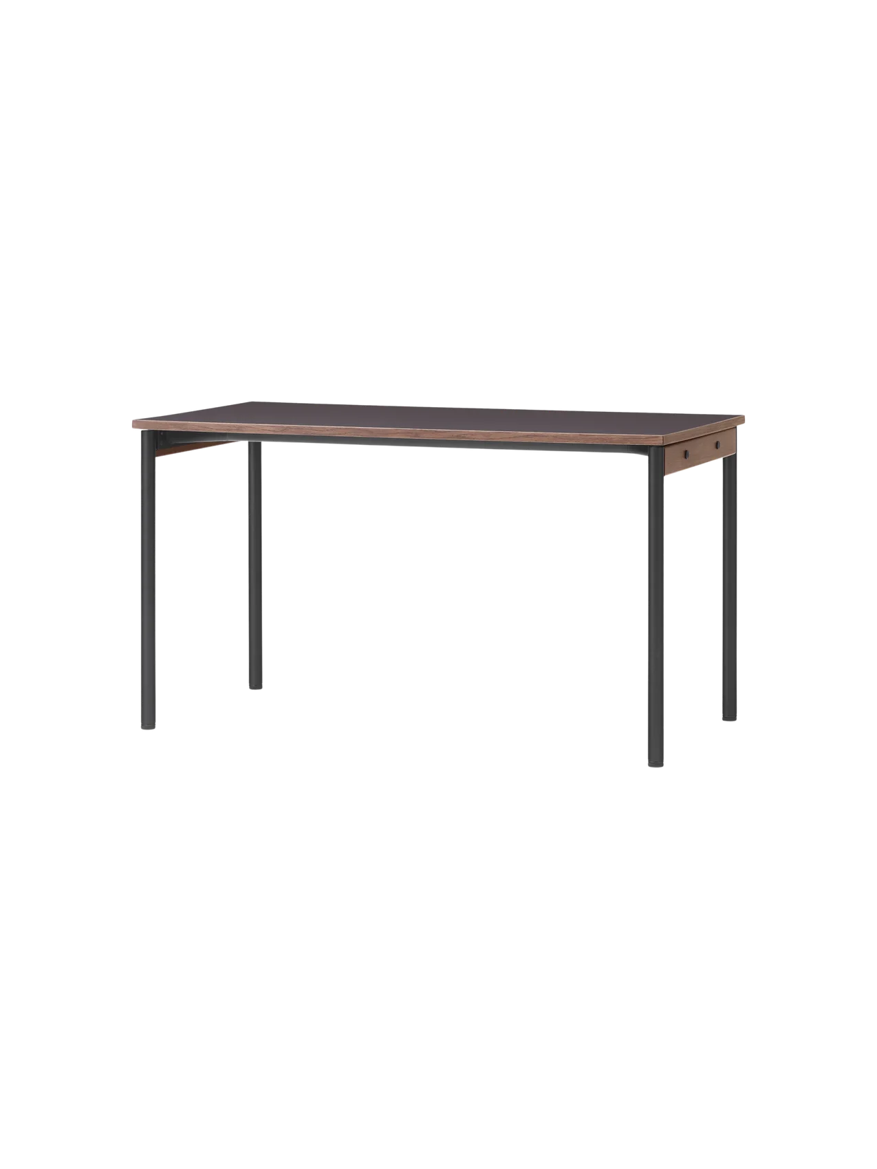 An angled view of the Co Table, featuring a rectangular terra laminate top, solid oak trim, and slender black steel legs.