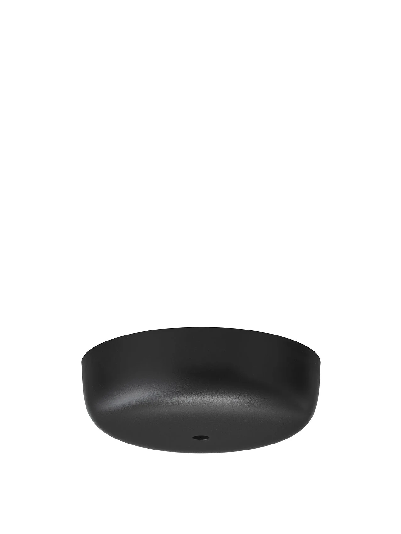 A low-angle view of the 1 pc. black Canopy, a matte black spare part for lighting fixtures, isolated on a white background.