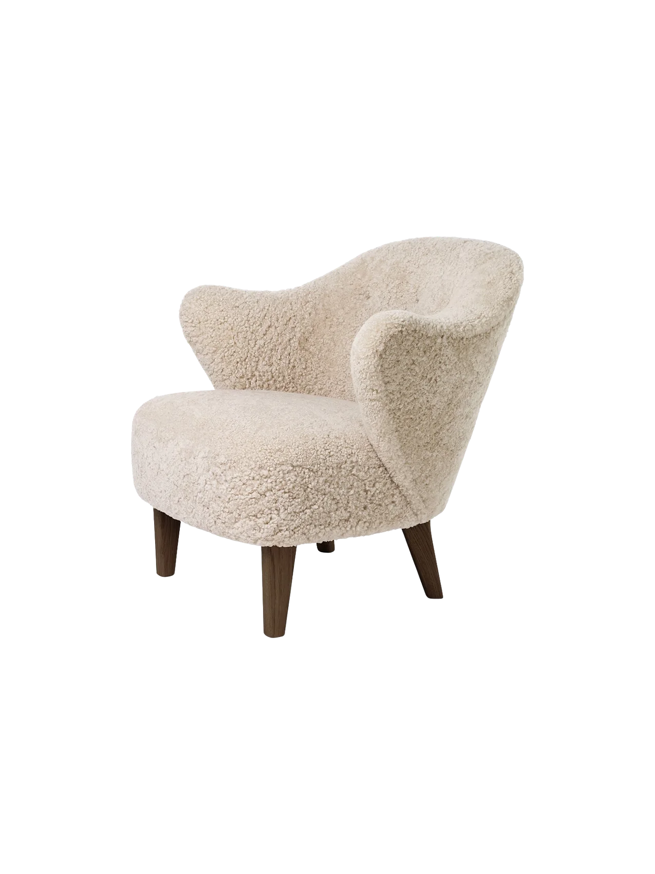 Angled view of the Ingeborg Lounge Chair, upholstered in fluffy off-white Moonlight sheepskin, with dark-stained oak legs.