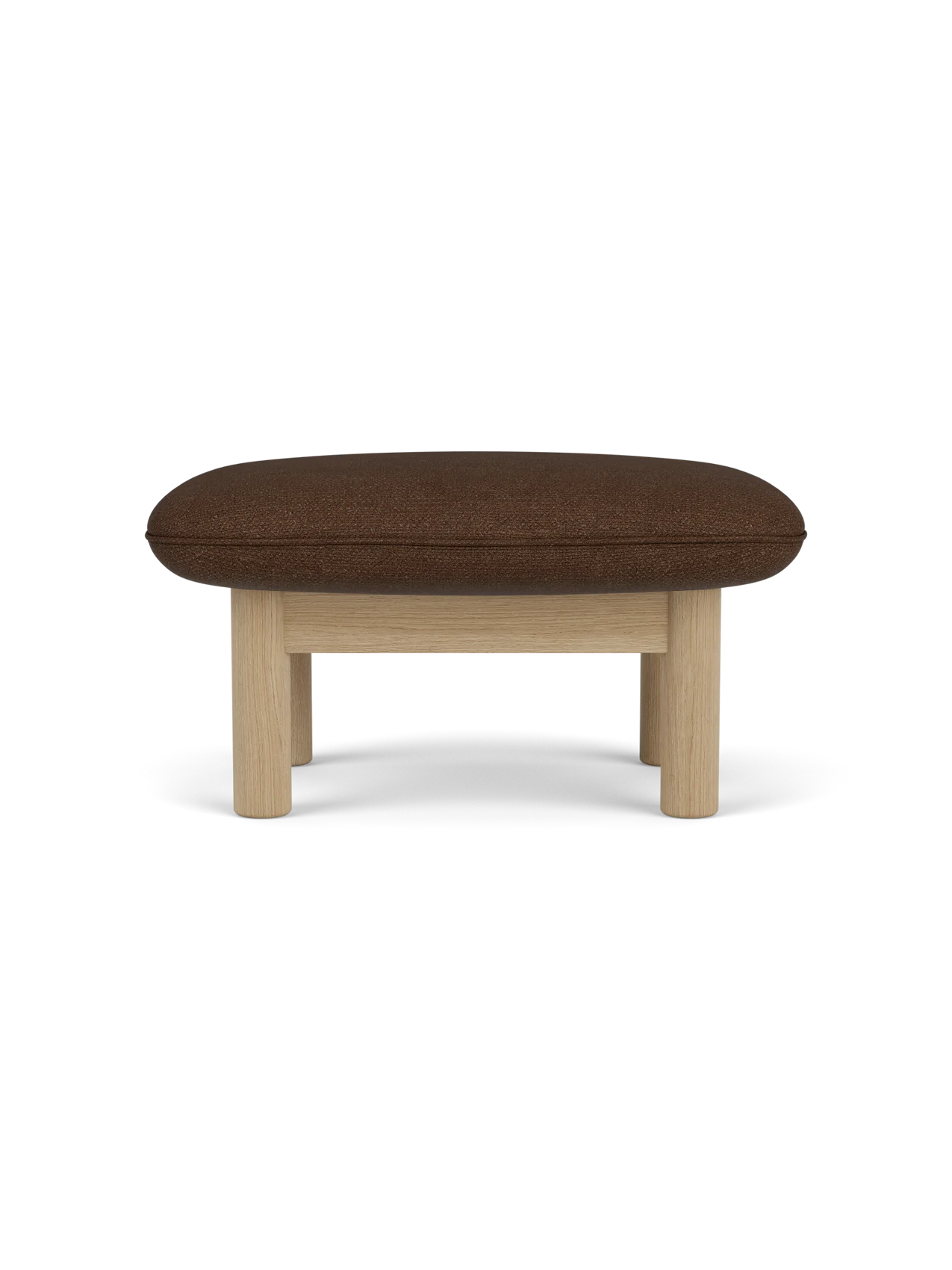 Side profile of the Brasilia Ottoman, upholstered in brown bouclé fabric with a natural oak frame and four cylindrical legs.