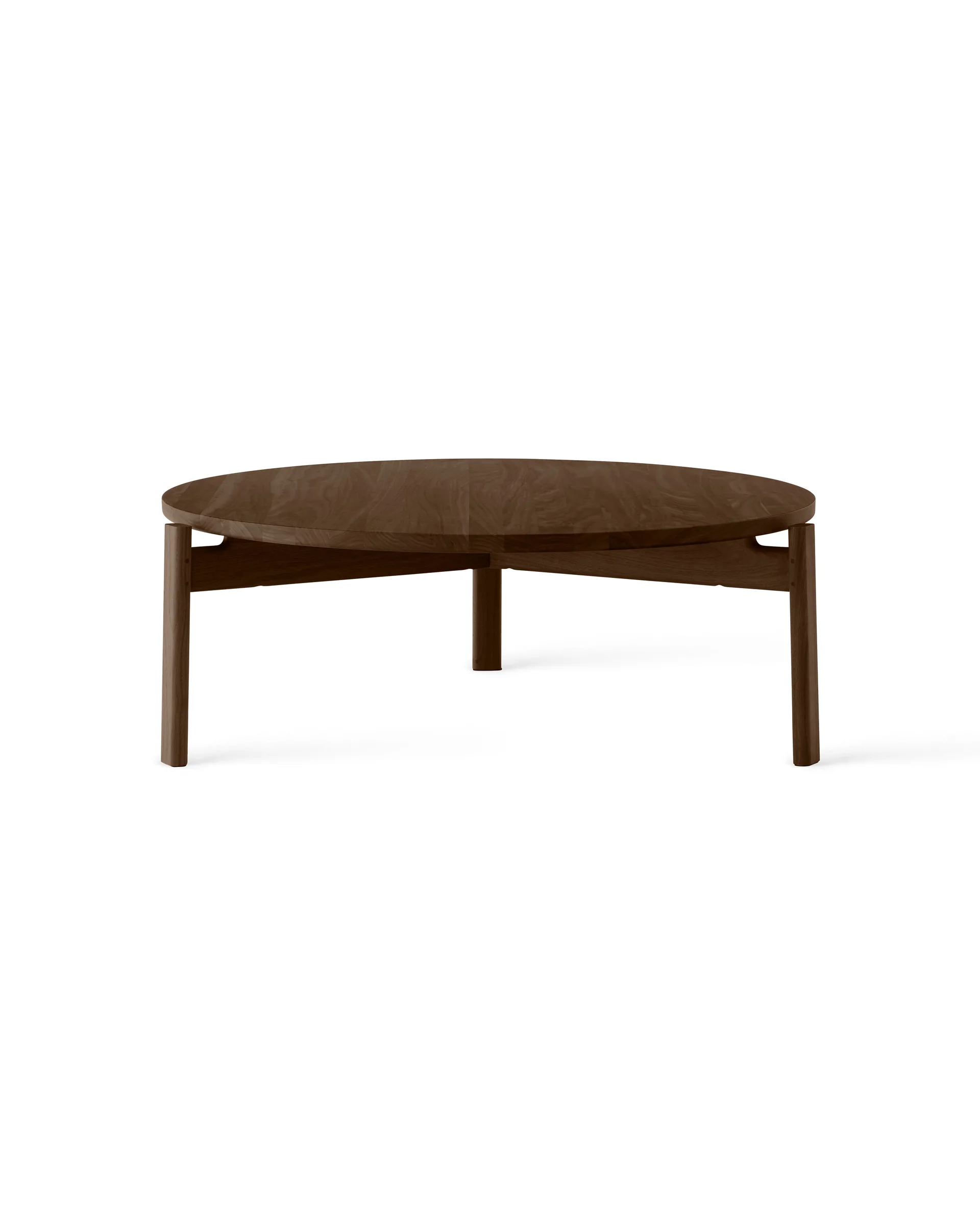 Round dark walnut wooden coffee table with tapered legs and visible wood grain, shown on white background
