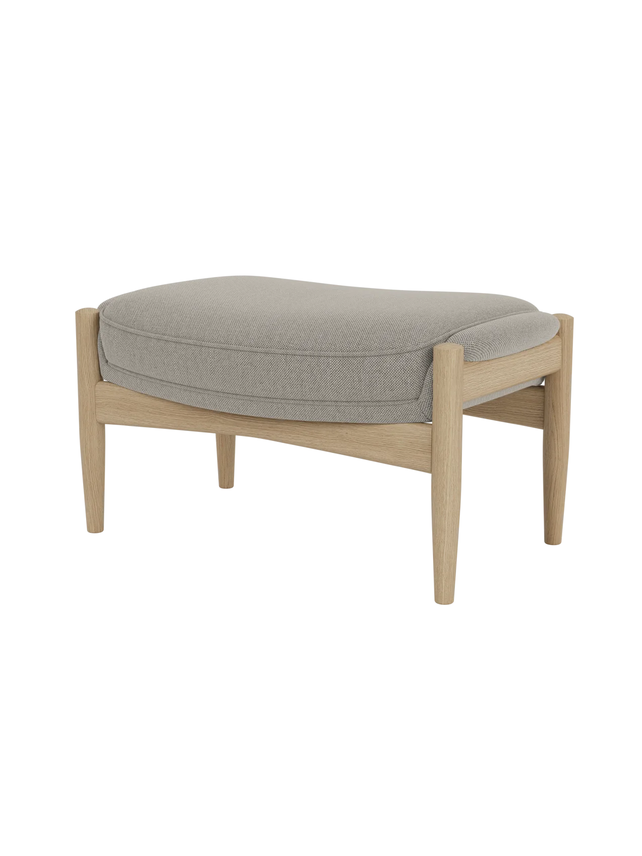 A side view of The Seal Ottoman, featuring a light grey upholstered cushion on a mid-century modern frame of natural oak.