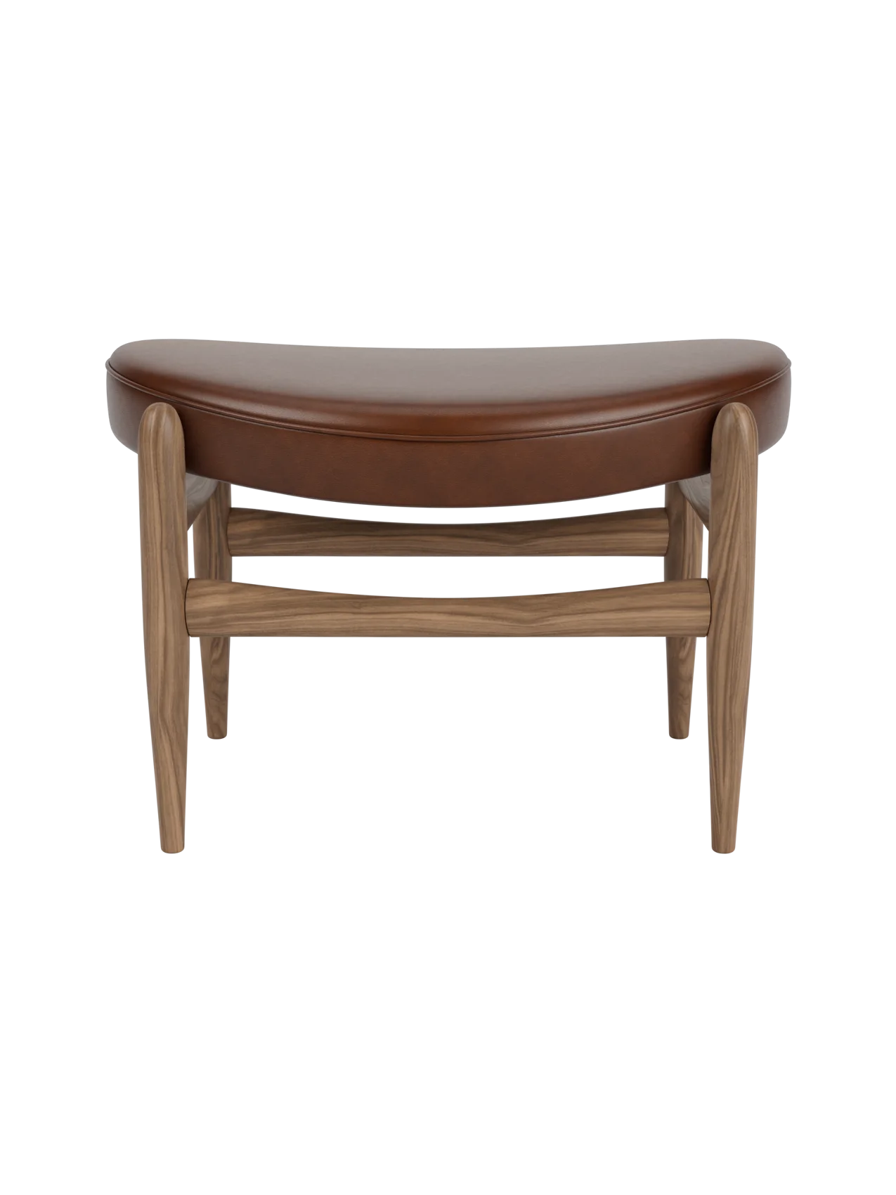 Front view of the Elizabeth Ottoman with a curved brown leather seat and a solid walnut frame on a black background.