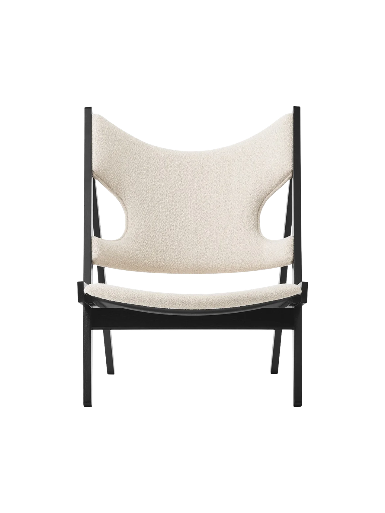 Front view of the Knitting Lounge Chair in Black Oak, featuring a textured ivory bouclé seat and backrest with side cut-outs.