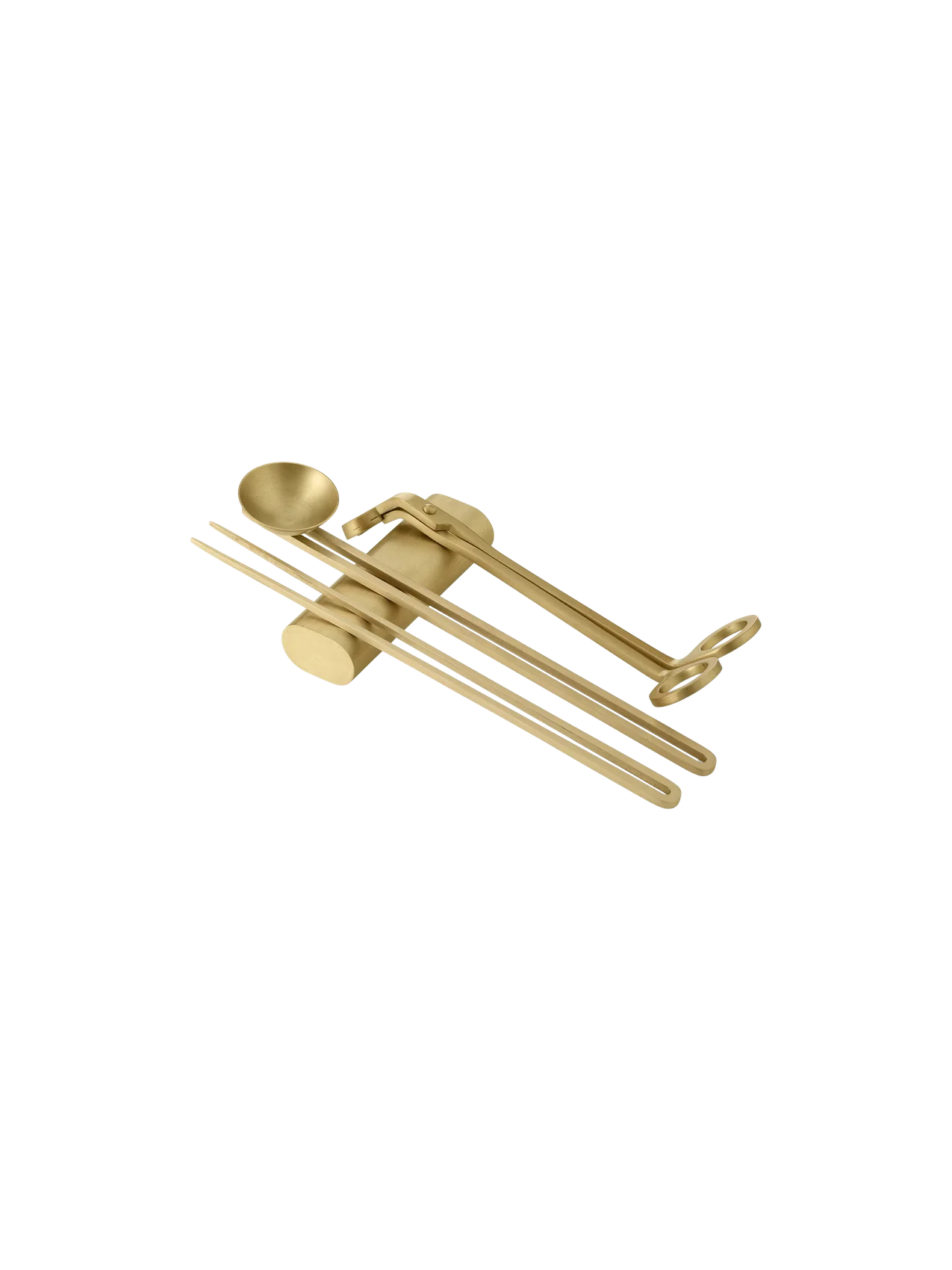 The Candle Care Kit in a brass finish, including a wick trimmer, a snuffer, and a dipper, isolated on a black background.