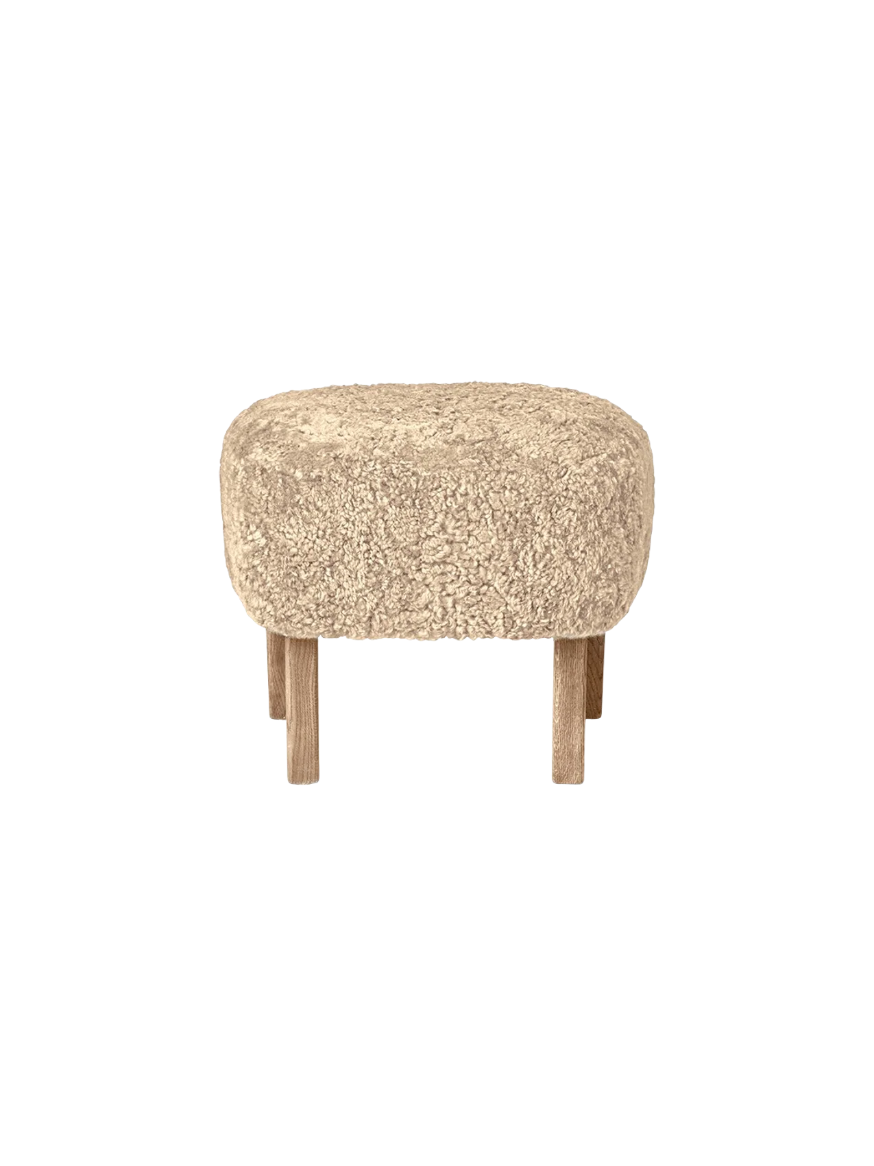 A front-facing view of the Ingeborg Ottoman. It has a fluffy, honey-coloured sheepskin top and four light oak legs.
