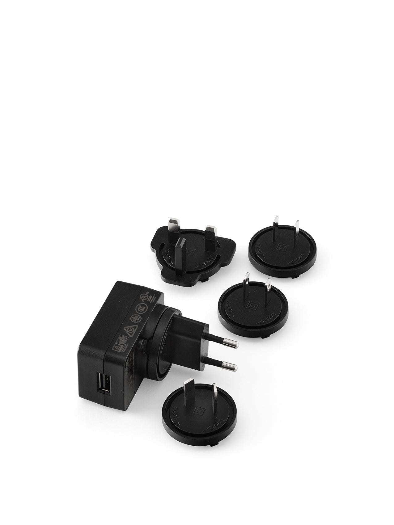 A black Universal Charger with a USB port and four interchangeable international plug heads, displayed on a white background.
