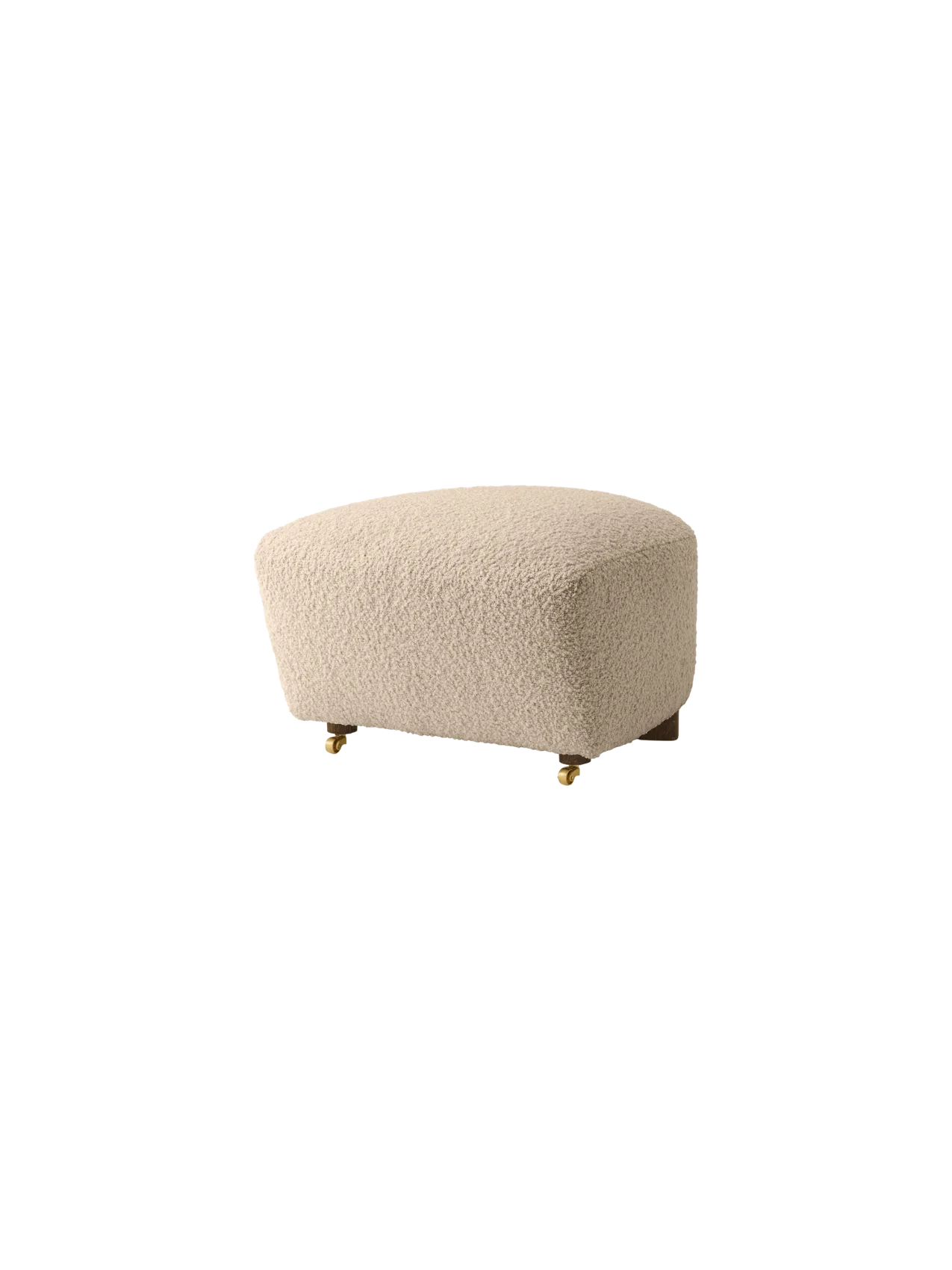 The Tired Man Ottoman in a textured cream fabric, shown at an angle, with dark wooden legs and small brass castors.