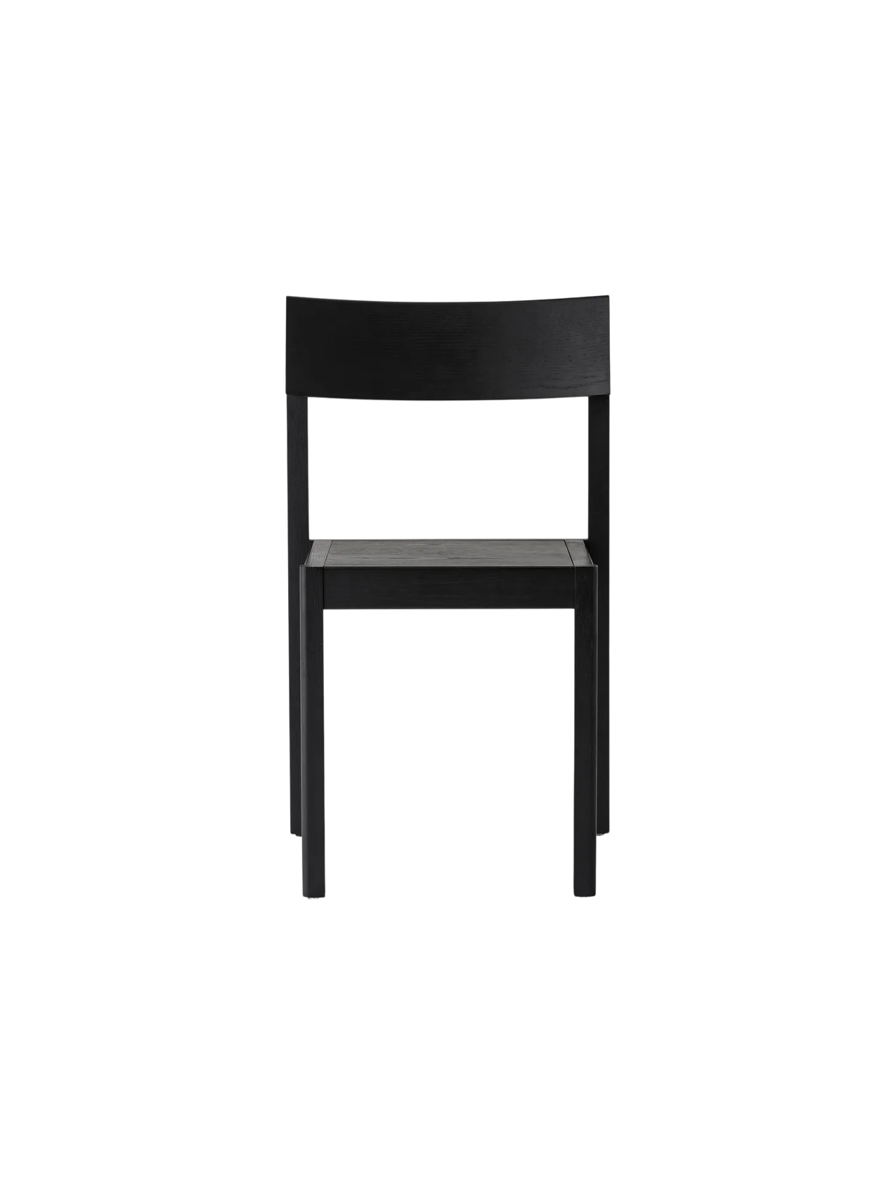 Black oak Mauro Dining Chair with a minimalist wooden frame and curved backrest against a plain white background.