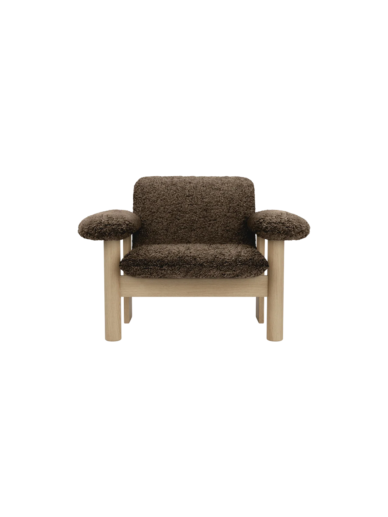 Front view of the Brasilia Lounge Chair, Low Back. The chair has a natural oak frame and dark brown Sheepskin Root upholstery