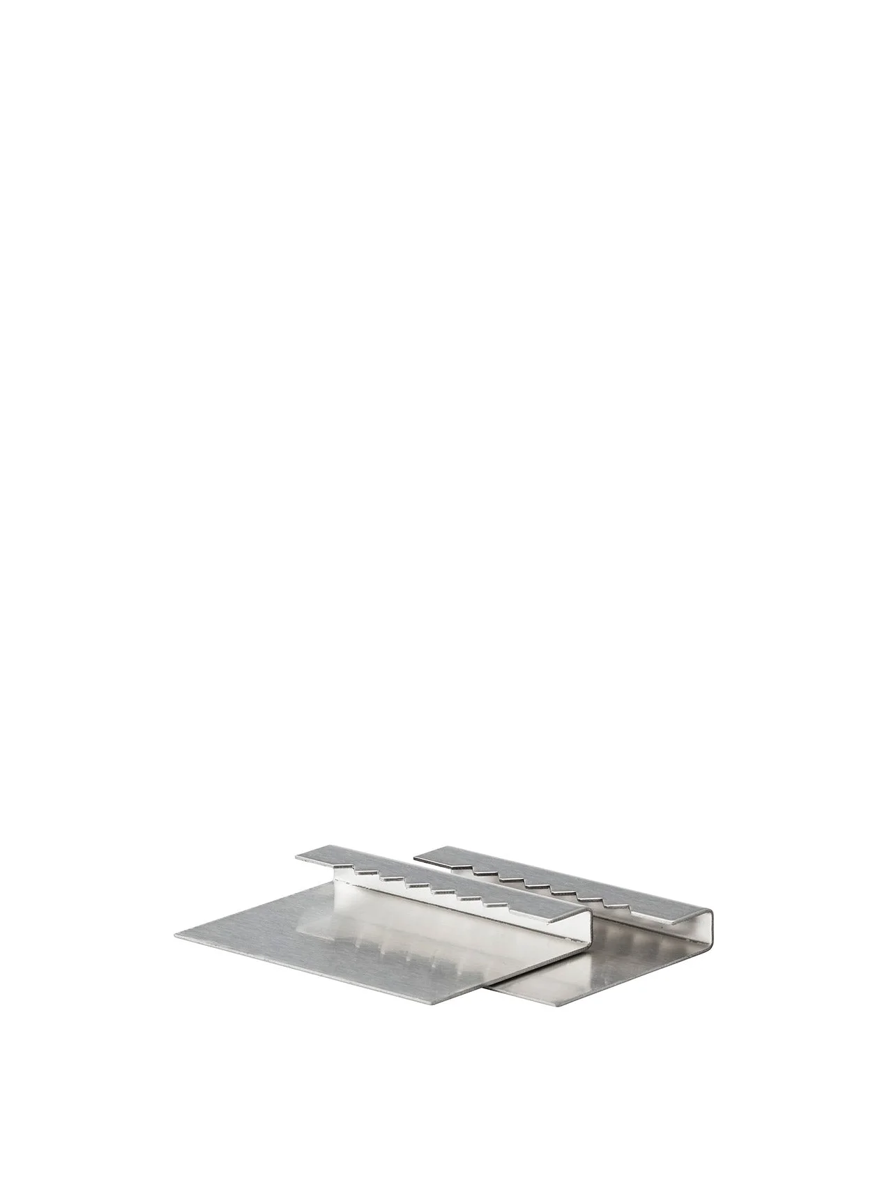 A pair of brushed metal Plinth Shelf mounting brackets with serrated edges, photographed on a white background.