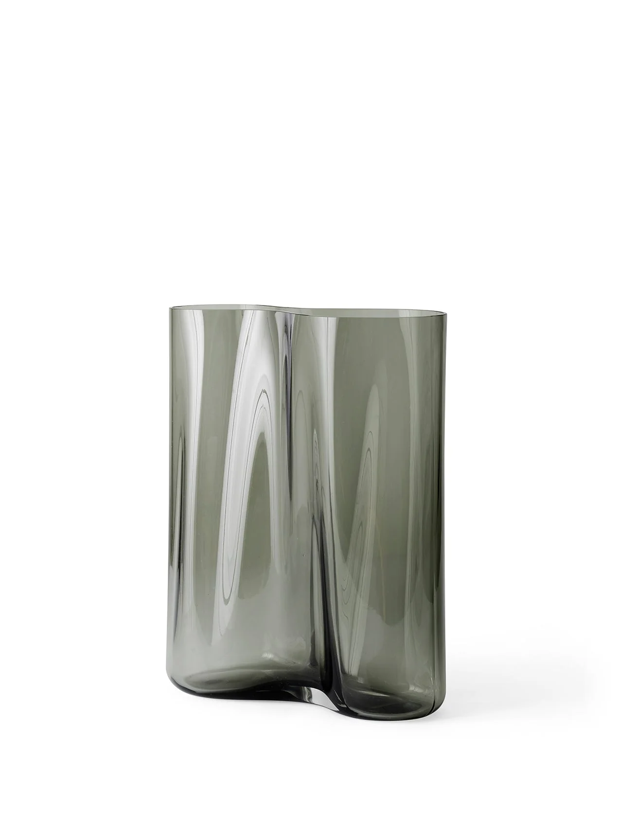A small Aer Vase made from smoky grey rippled glass, creating an undulating silhouette, pictured against a white background.