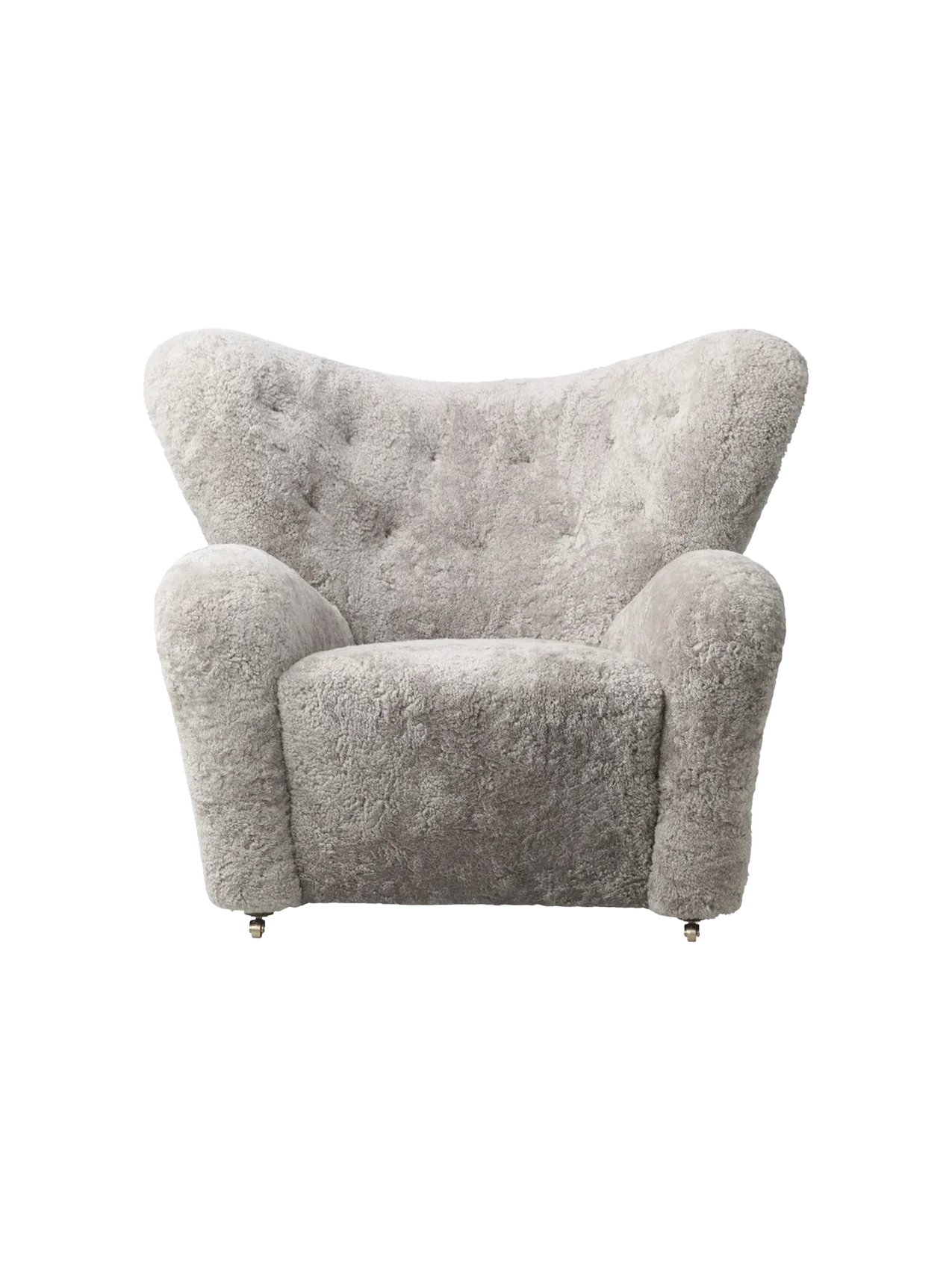 Front view of The Tired Man Lounge Chair in Green Tea sheepskin, showing its curved back and casters.