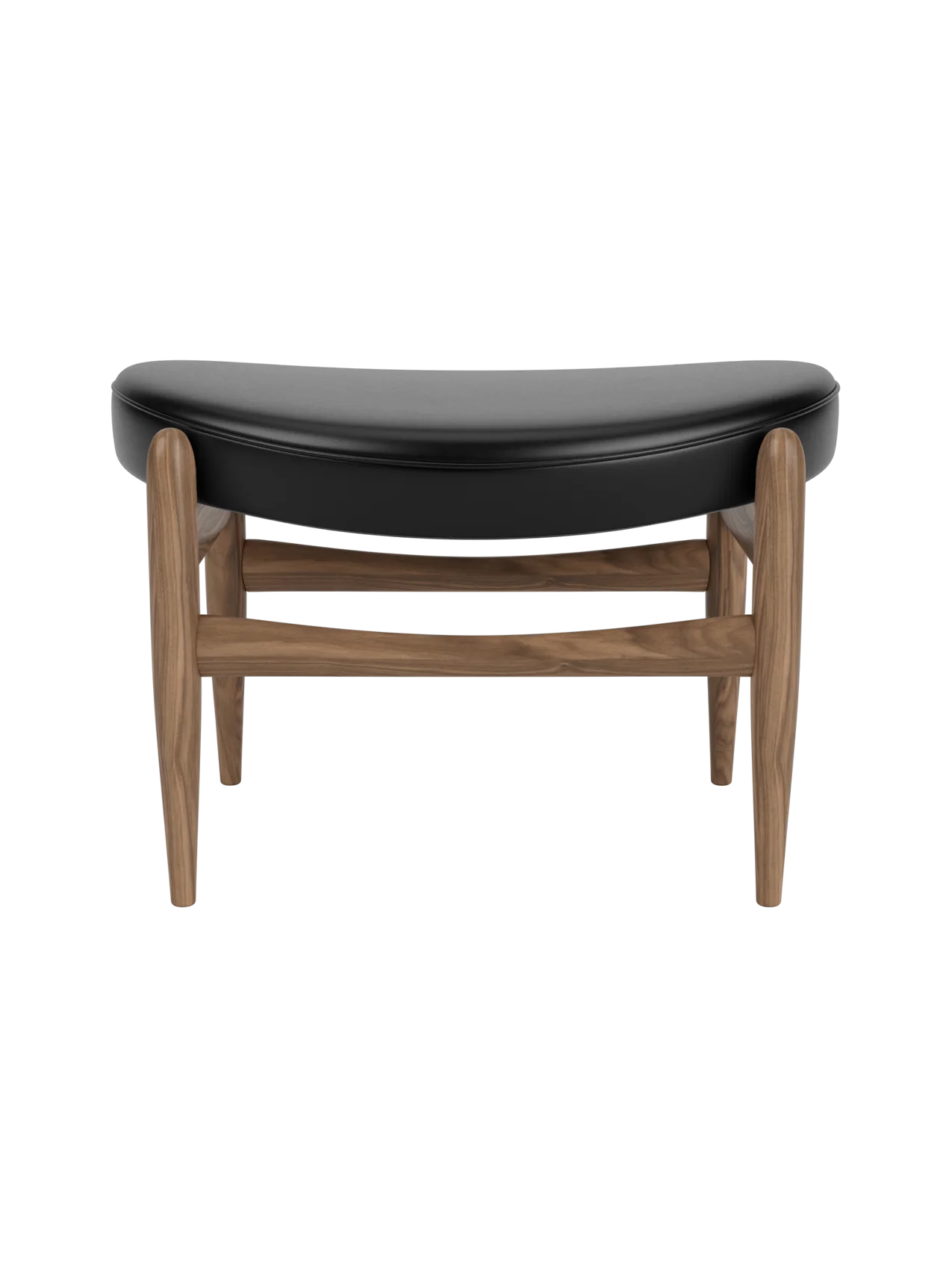 Elizabeth Ottoman featuring a curved black leather seat and an elegant walnut frame by Ib Kofod-Larsen.