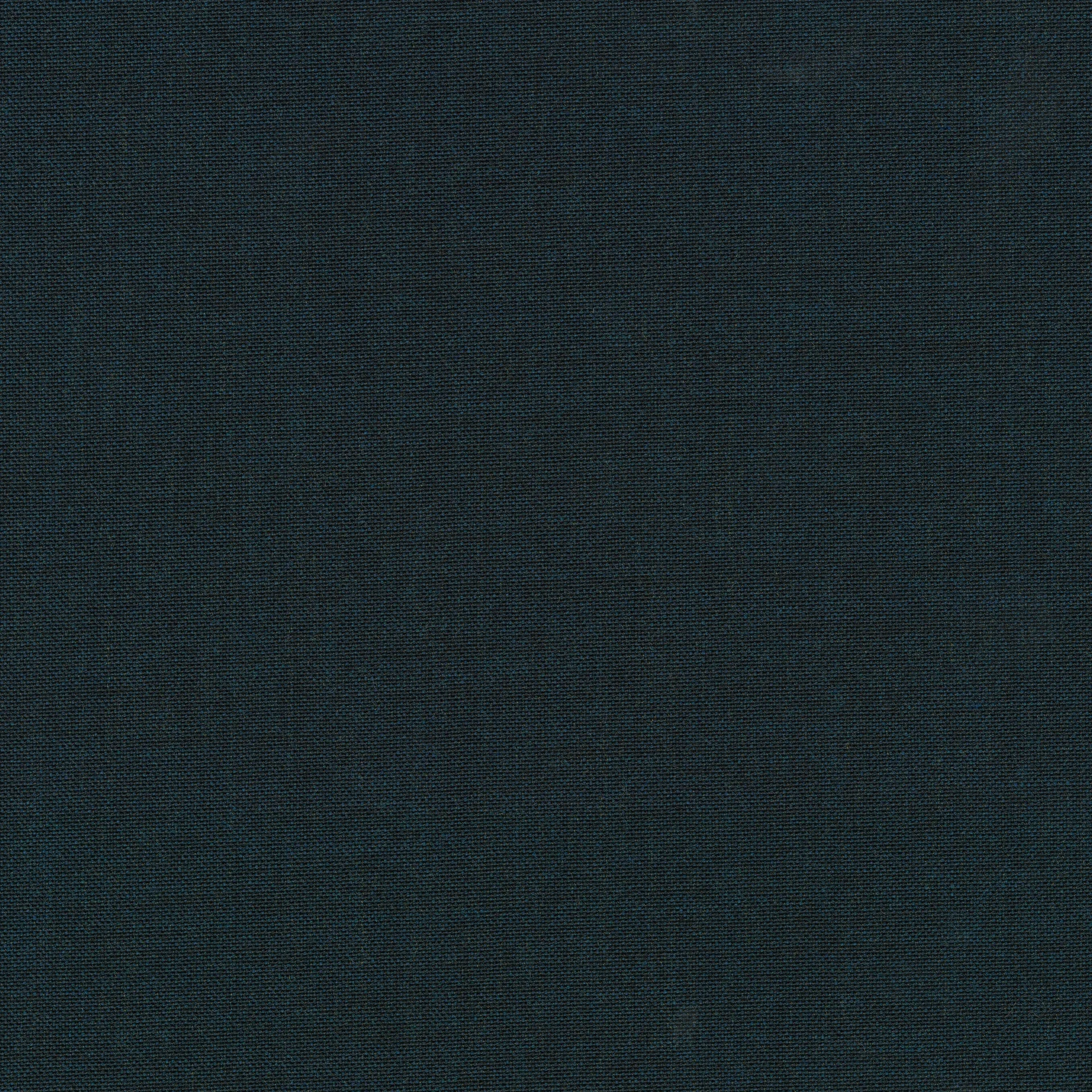 Close-up of dark navy woven fabric with tight, textured cotton-like weave.