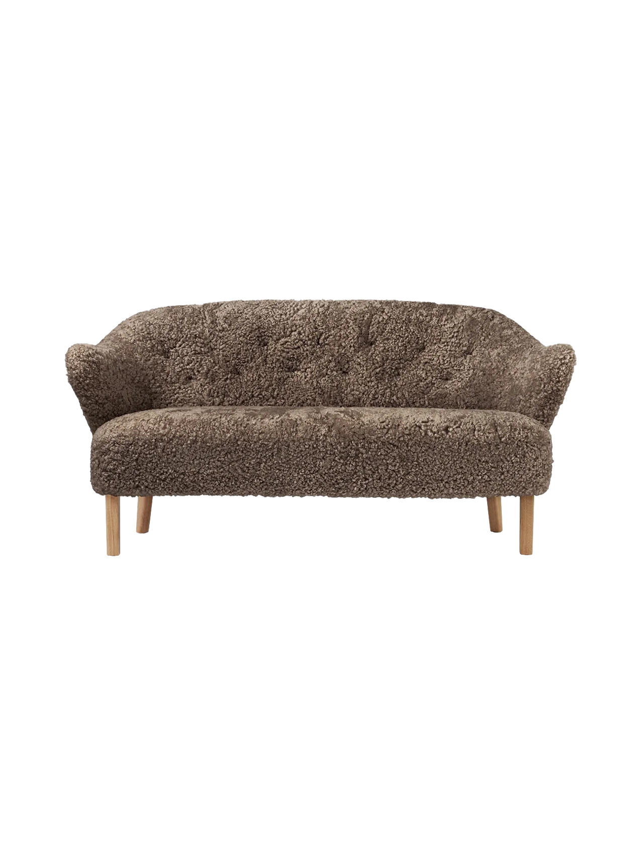 Front view of the Ingeborg Sofa in textured, brown Sahara sheepskin, featuring a button-tufted back and light oak legs.
