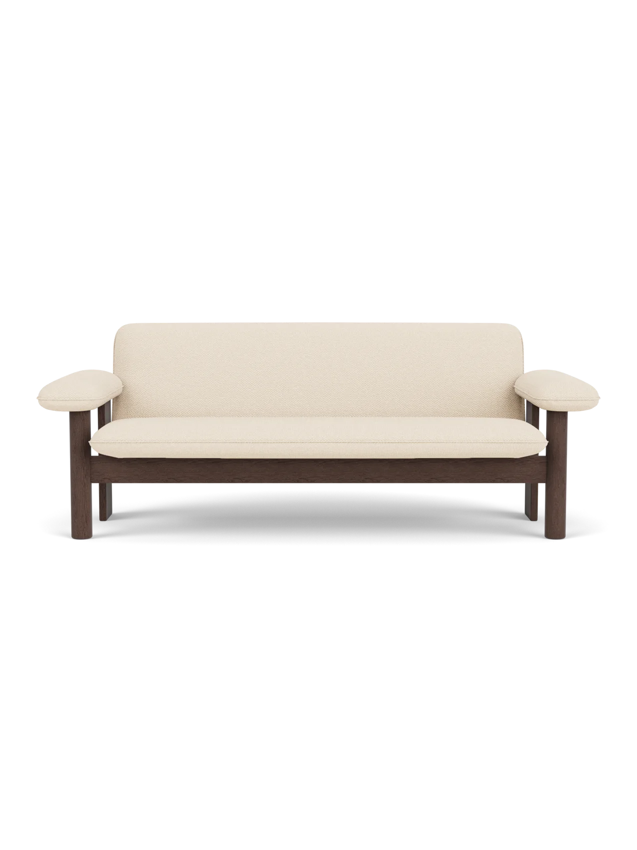 Front view of the Brasilia Sofa, featuring a dark stained oak frame and upholstered in light-coloured Logan Jasmine textile.