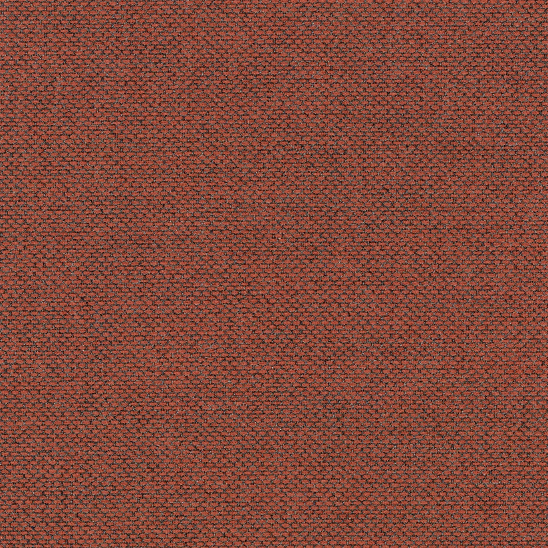 Close-up of red and charcoal woven upholstery fabric with small textured basketweave pattern